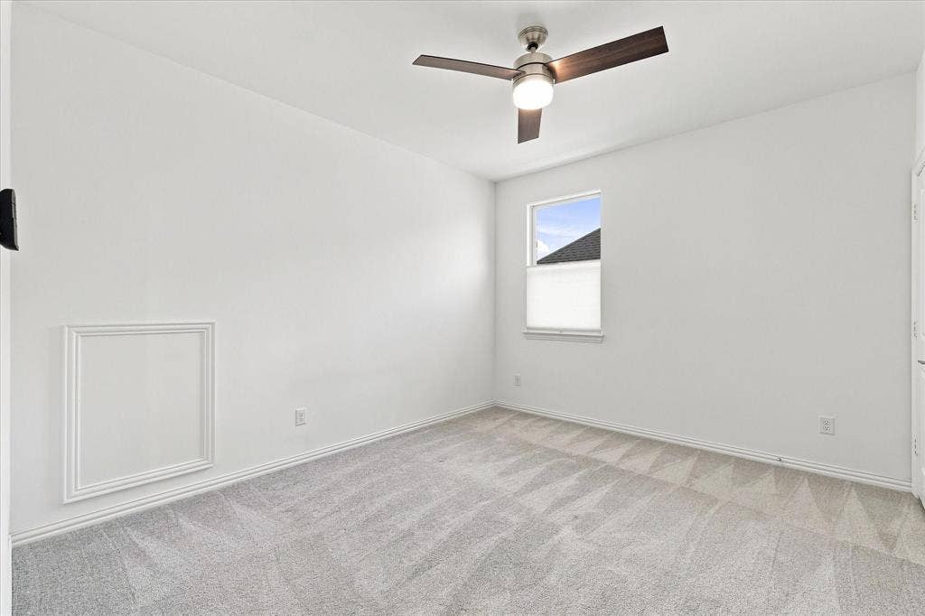 3109 Taunton Way, McKinney, TX 75069 Carpeted flooring with a ceiling fan, white walls, and a window