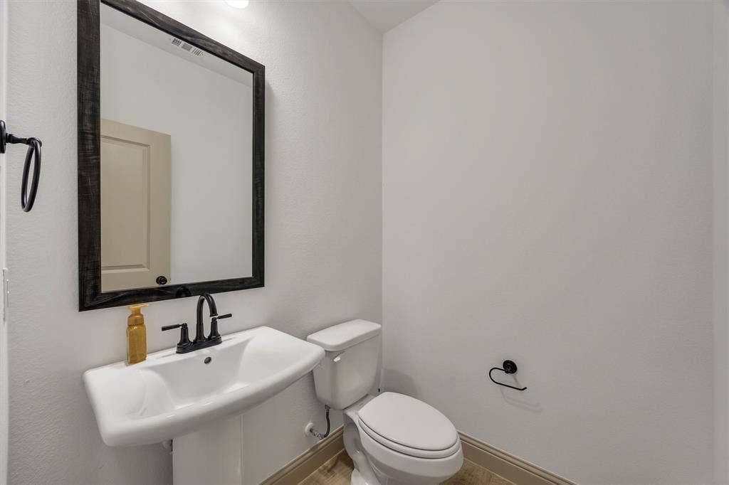 Down stair Half bath with Pedestal sink