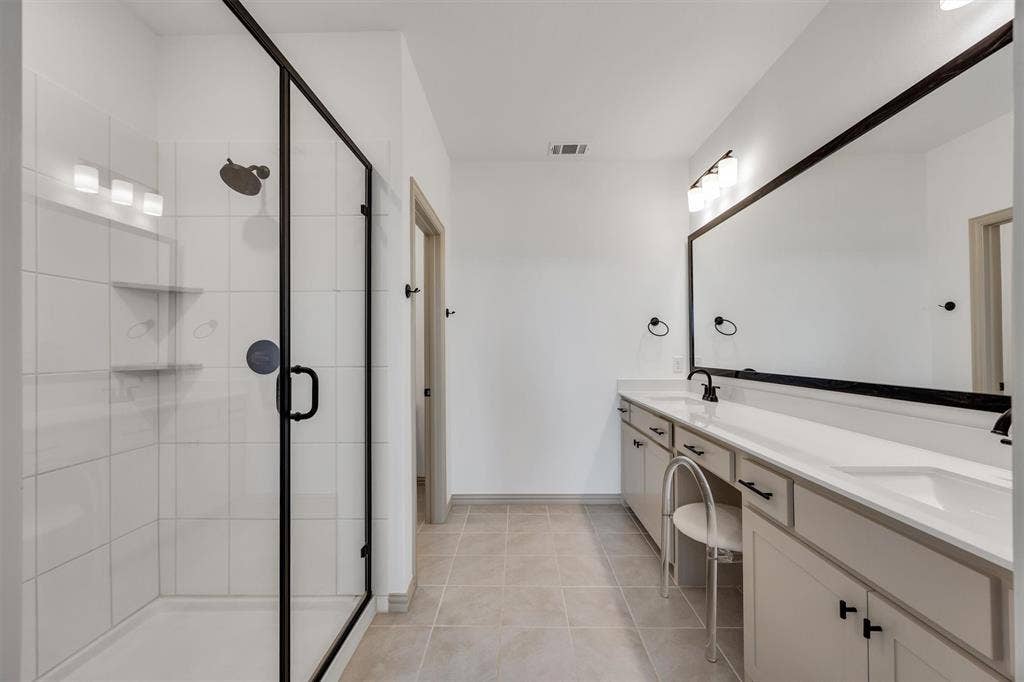 Primary ensuite bathroom with large shower