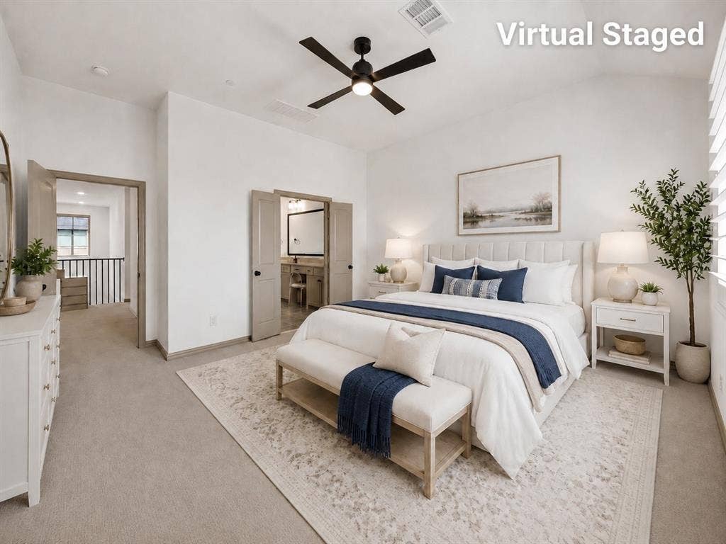 Virtual Staged Primary Bedroomvaulted ceilings, a ceiling fan, window with plantation shutters
