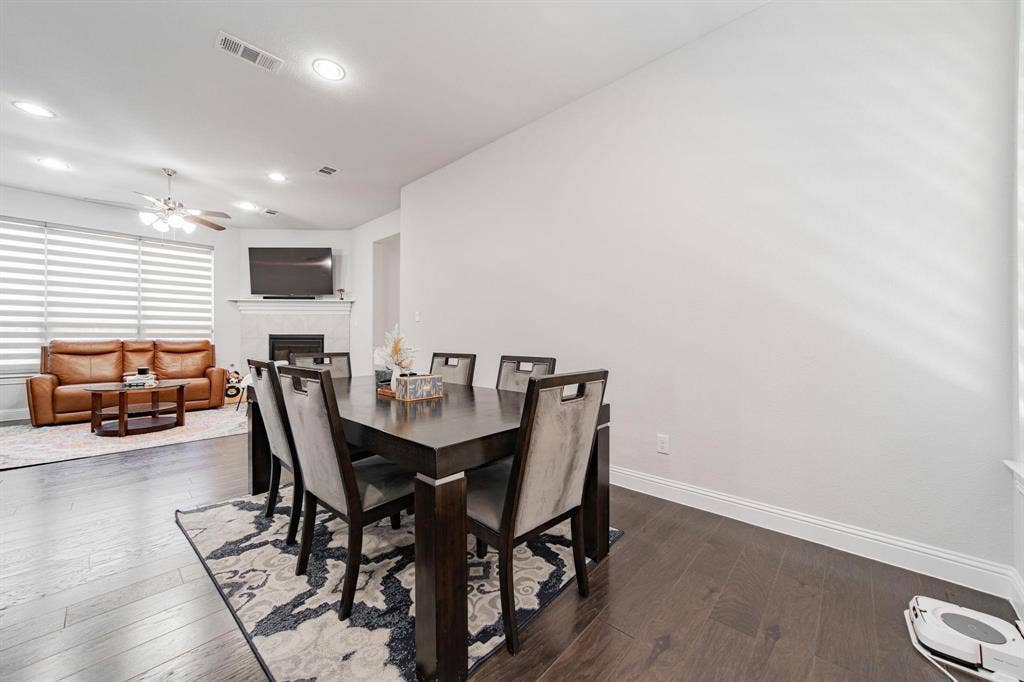 Dark wood-finish flooring throughout