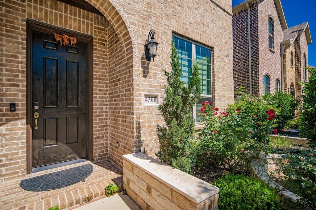 Brick exterior with arched entryway