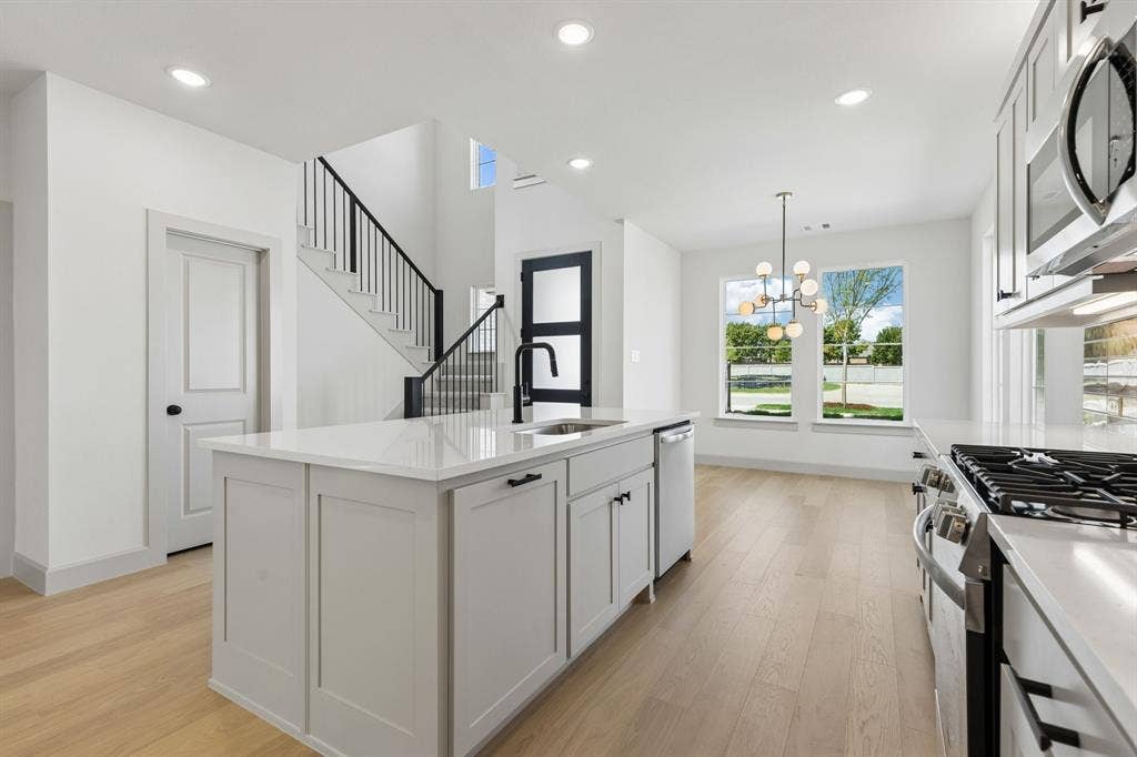 3716 Malamute Run, McKinney, TX 75071 This dream home features a spacious kitchen island where friends and family are sure to gather round!