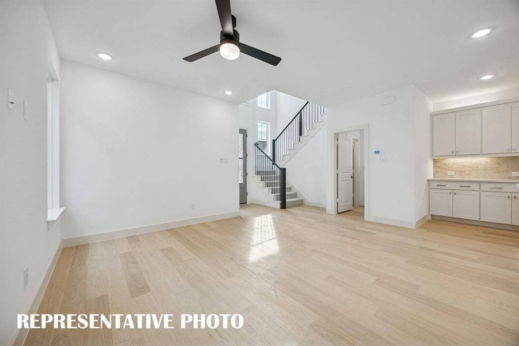 3737 Homer Court, McKinney, TX 75071 Your new family room offers lovely flooring with plenty of windows to fill the space with natural light. REPRESENTATIVE PHOTO