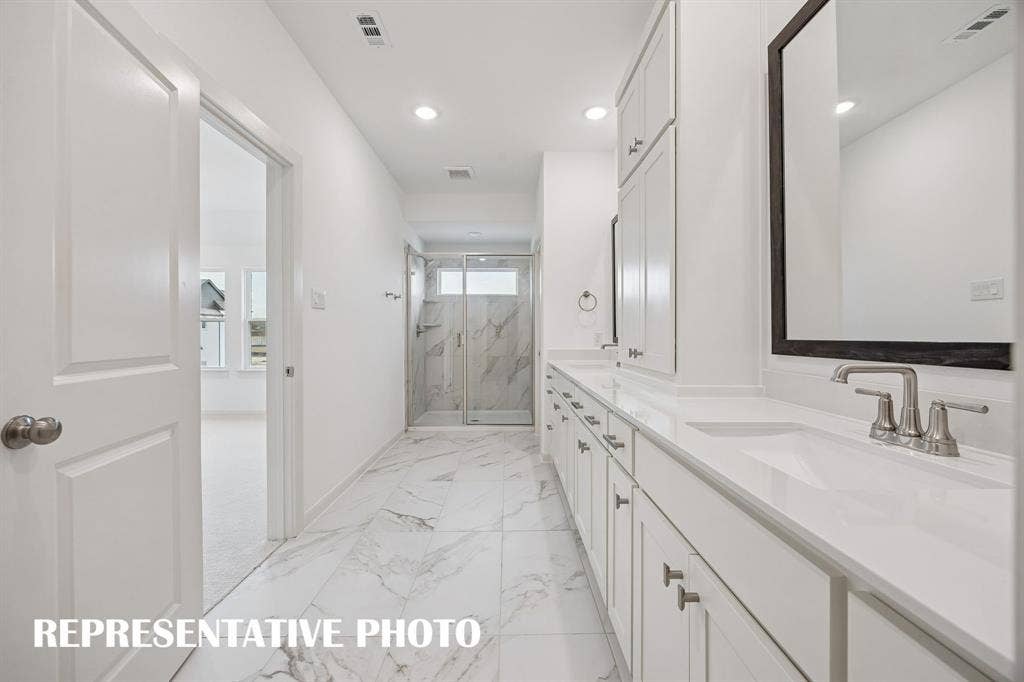 3737 Homer Court, McKinney, TX 75071 The spacious walk in shower is the cherry on top in this luxuriously finished owner's bath! REPRESENTATIVE PHOTO