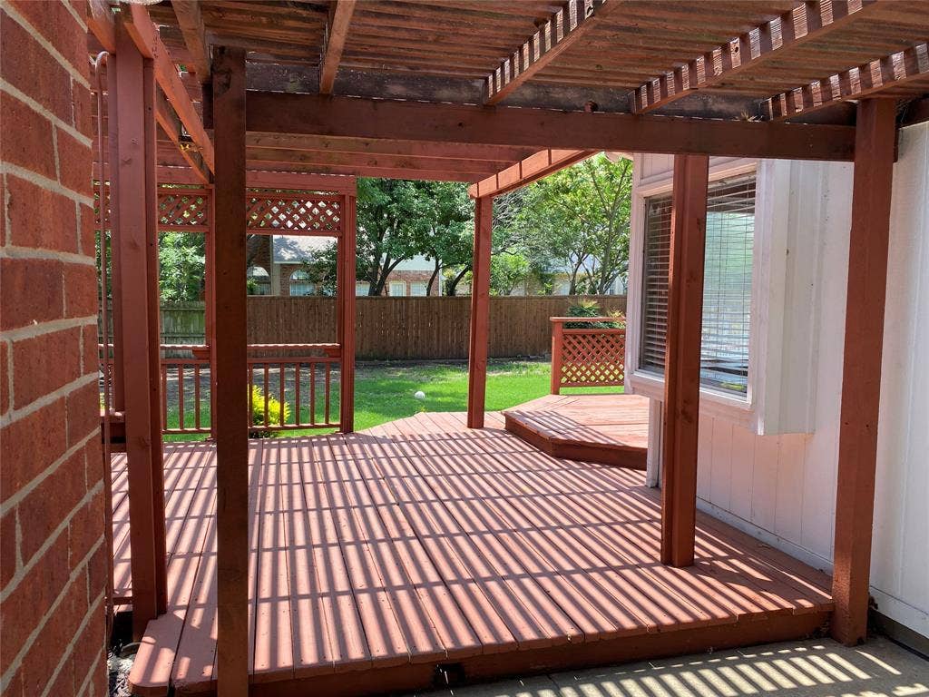 From Back door looking toward the Decking and yard