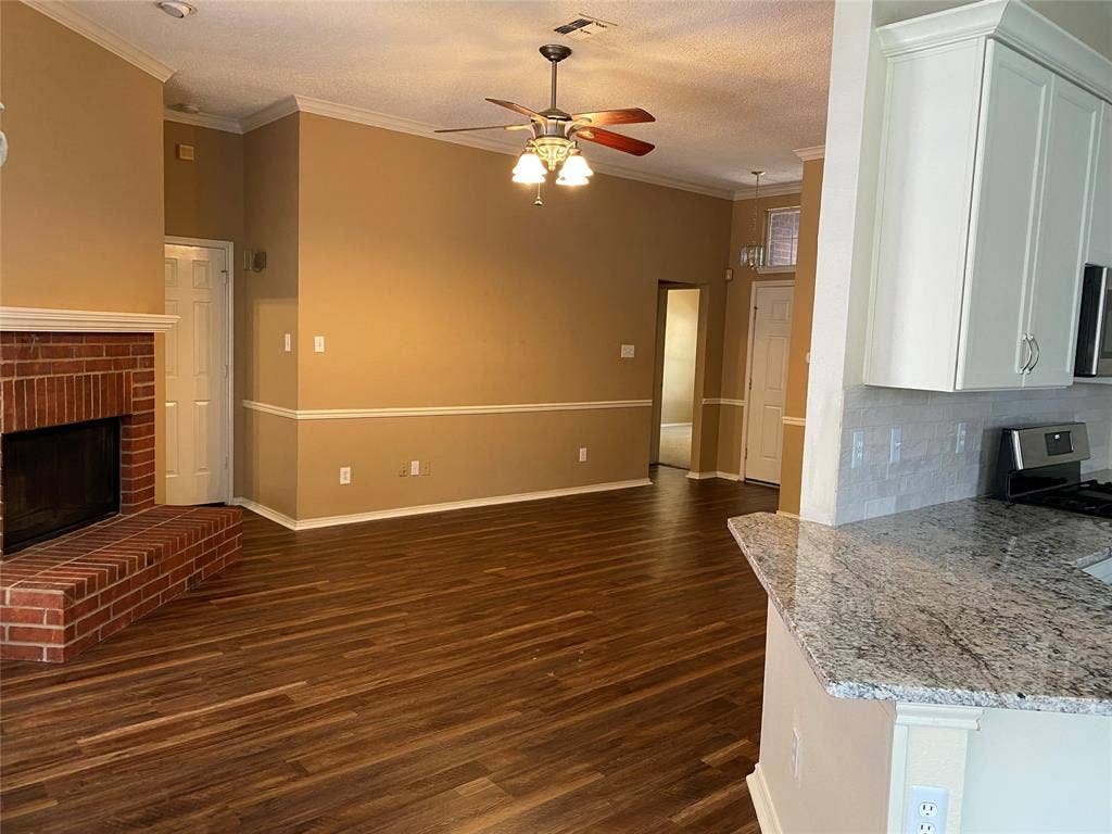 View of Open Living and Breakfast bar at right