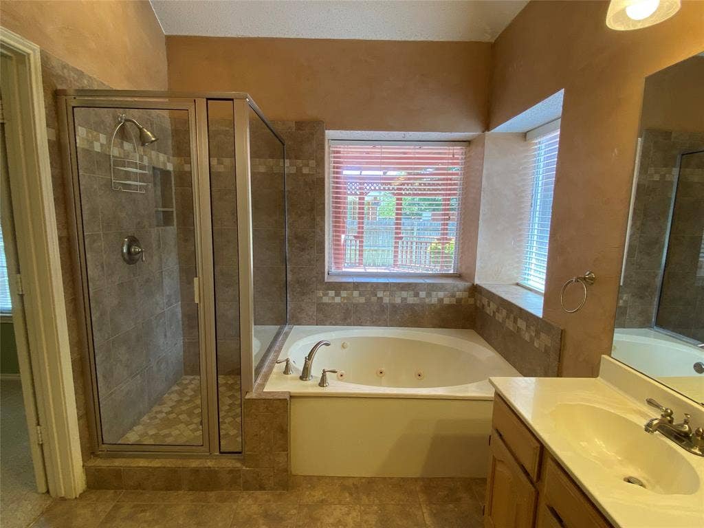 Primary Bathroom included a jetted garden tub & separate Shower