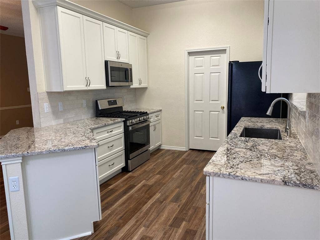 View showing lots of counter space & cabinets
