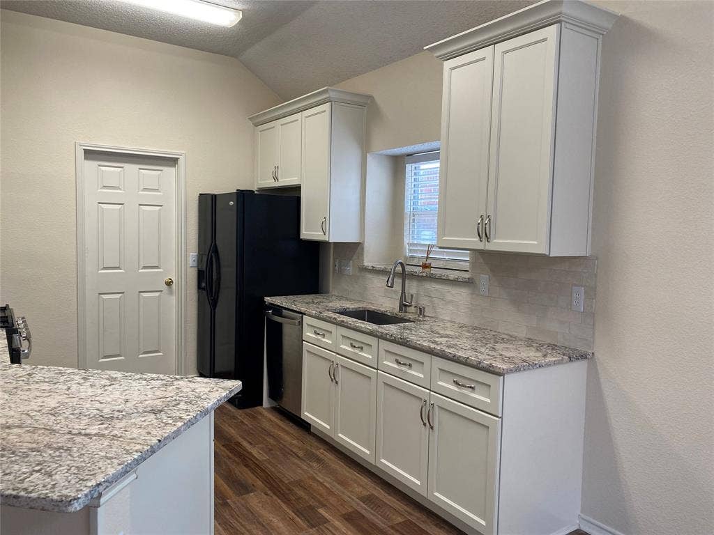 Kitchen showing Granite counters and Farm Sink