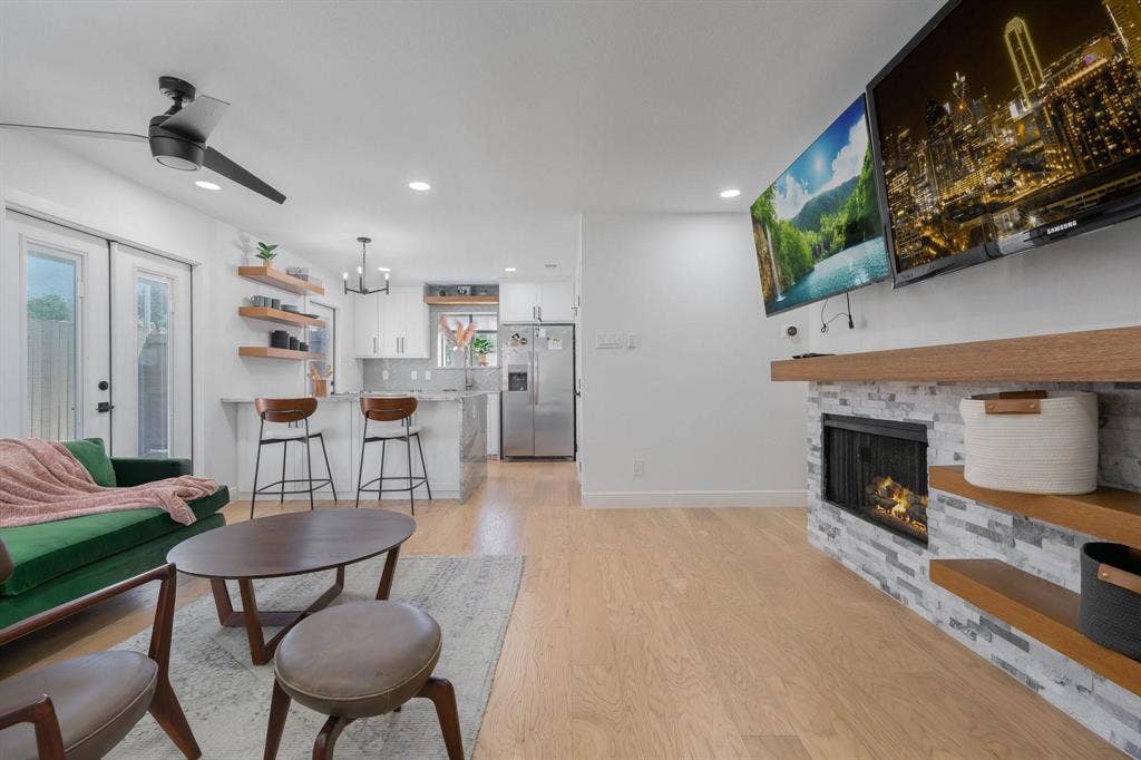 1805 W Spring Creek Parkway, #MM2, Plano, TX 75023 Living area with wood-finish flooring, a contemporary ceiling fan, and recessed lighting