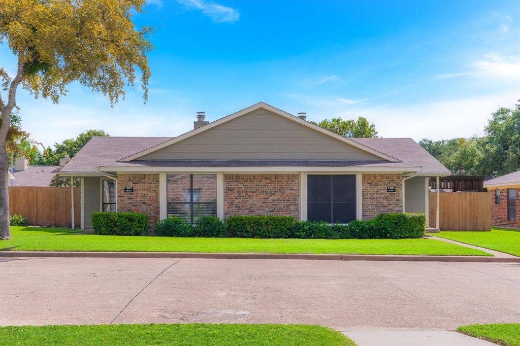 1805 W Spring Creek Parkway, #MM2, Plano, TX 75023 Brick exterior with light-toned siding
