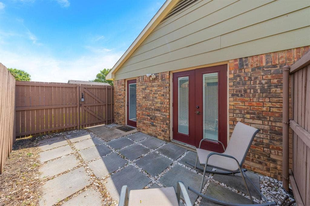 1805 W Spring Creek Parkway, #MM2, Plano, TX 75023 Brick exterior with horizontal siding accent