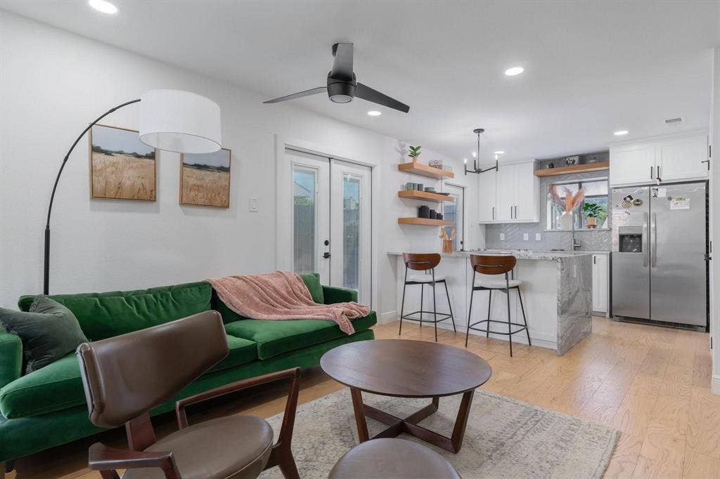 1805 W Spring Creek Parkway, #MM2, Plano, TX 75023 Recessed lighting, wood-finish flooring, ceiling fan, white cabinetry, and stainless steel refrigerator