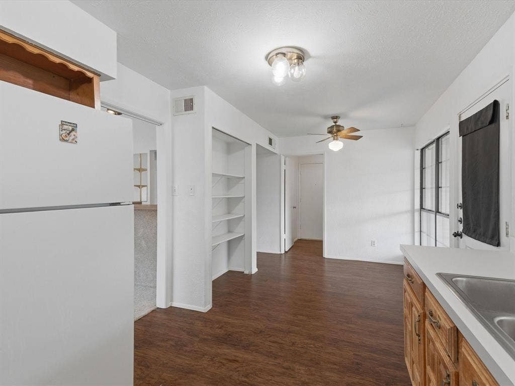 7612 Jerome Drive, Plano, TX 75025 Wood-finish flooring throughout the main area