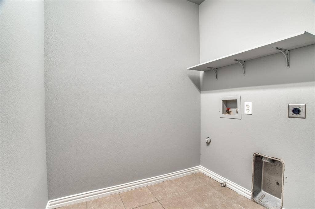 2364 Calendar Court, Grand Prairie, TX 75050 Built-in shelving, tile flooring, and utility hookups