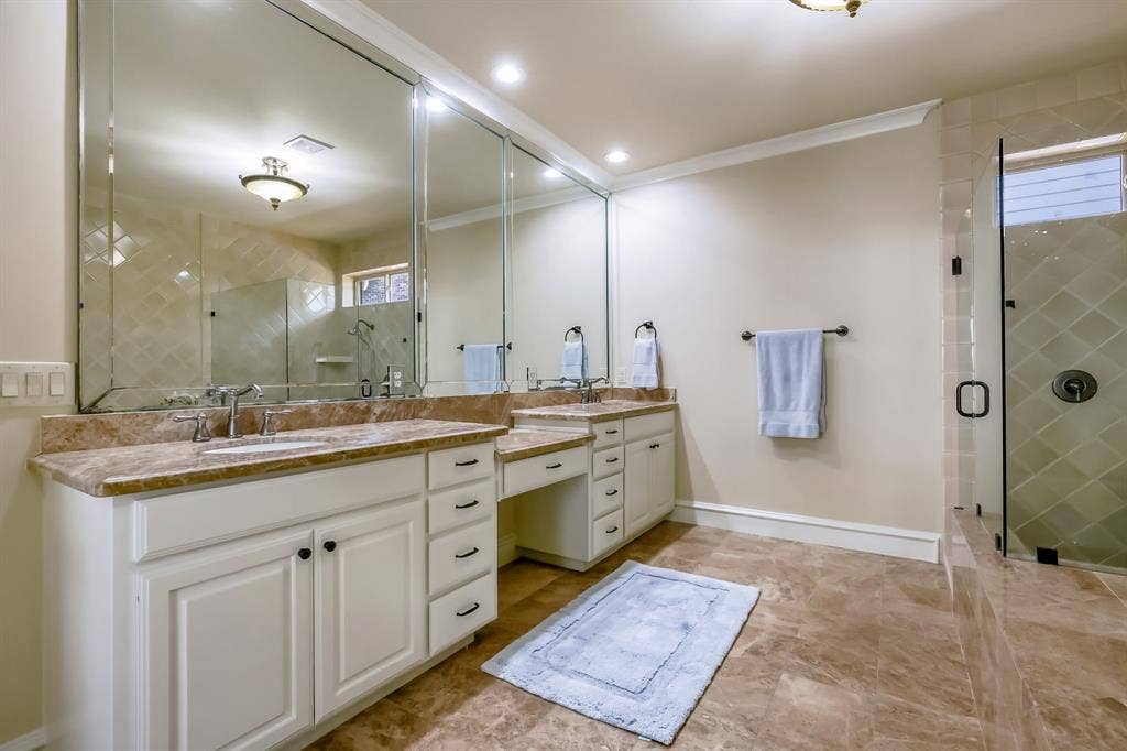 6335 Vanderbilt Avenue, Dallas, TX 75214 Double vanities and sit down vanity.