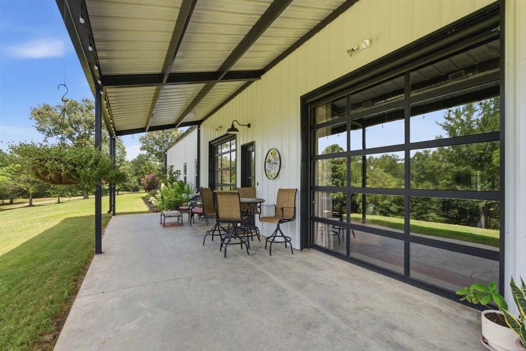 12842 Farm to Market 838, Overton, TX 75684 Expansive green lawn with scattered mature trees and natural landscaping