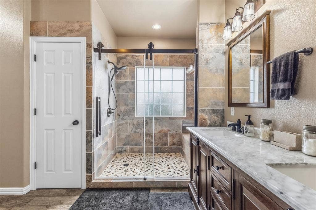 1308 Madeline Street, Commerce, TX 75428 Spa like walk in shower