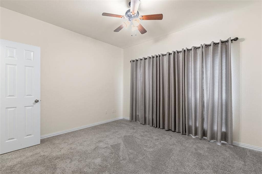 1308 Madeline Street, Commerce, TX 75428 Secondary bedroom with walk in closet