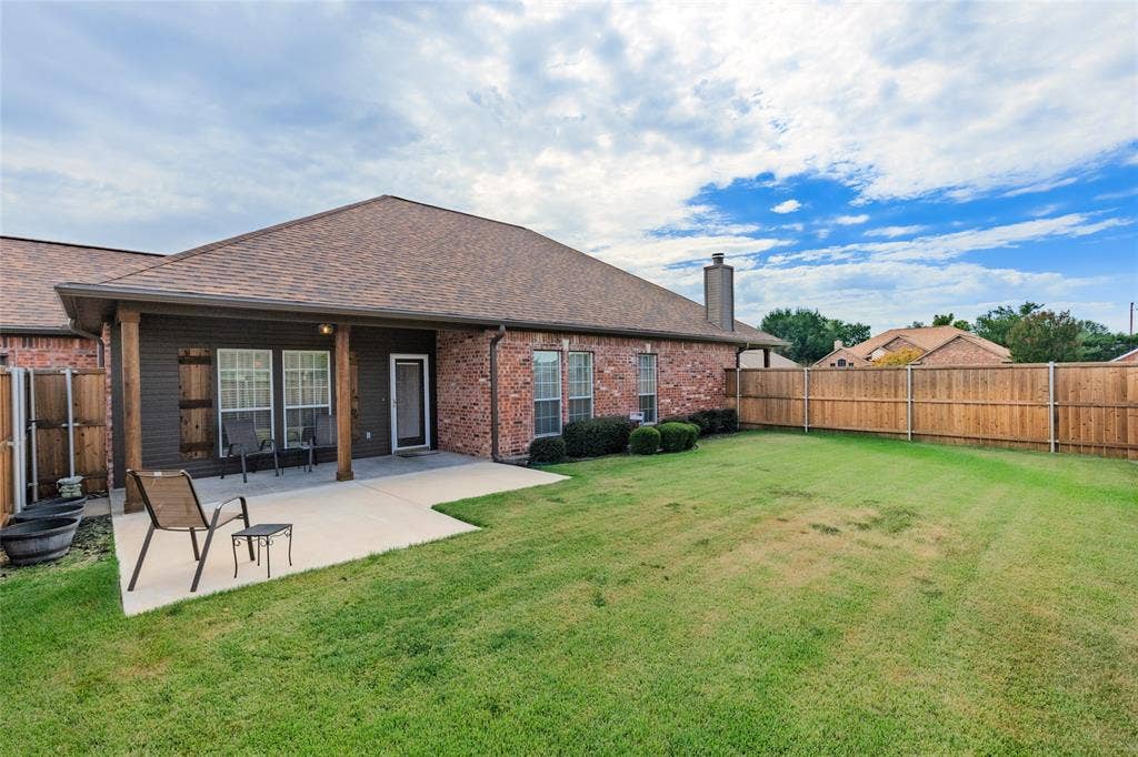 1308 Madeline Street, Commerce, TX 75428 Covered patio in one of the yards