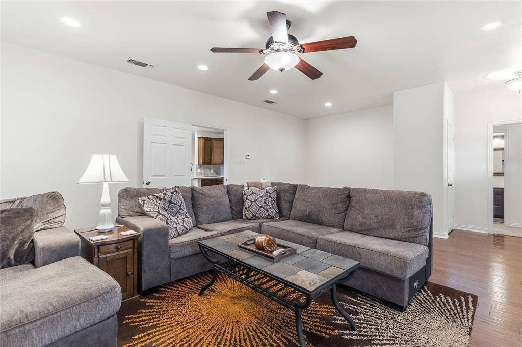 1308 Madeline Street, Commerce, TX 75428 Spacious living room with a small nook perfect for a home office