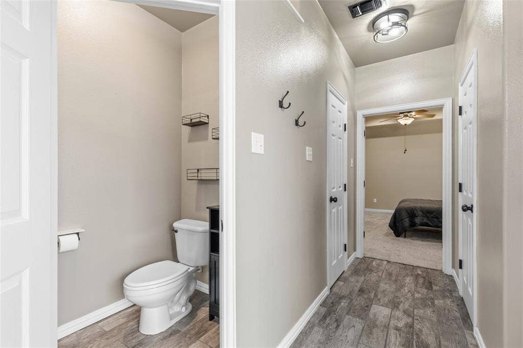 1308 Madeline Street, Commerce, TX 75428 Spacious master bath with two walk in closets.