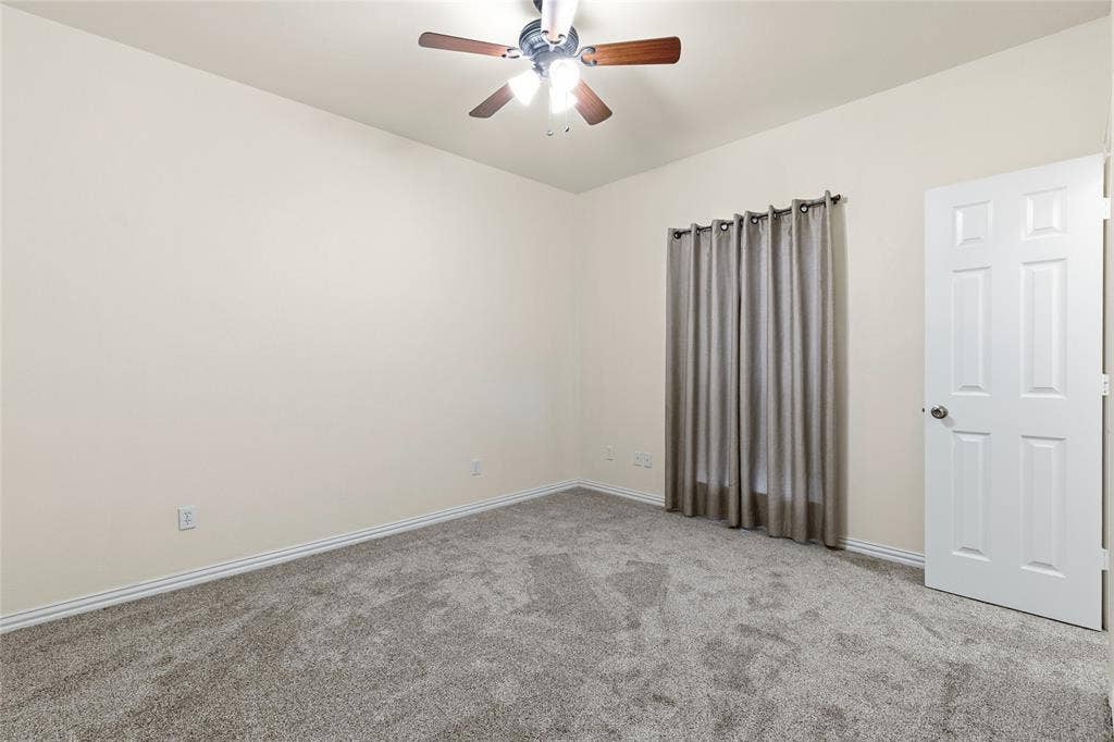 1308 Madeline Street, Commerce, TX 75428 Secondary bedroom with walk in closet