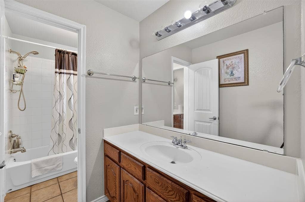 3002 Silver Springs Way, Rowlett, TX 75089 Jack & Jill Bath, Separate Sink, Built-In Cabinets.