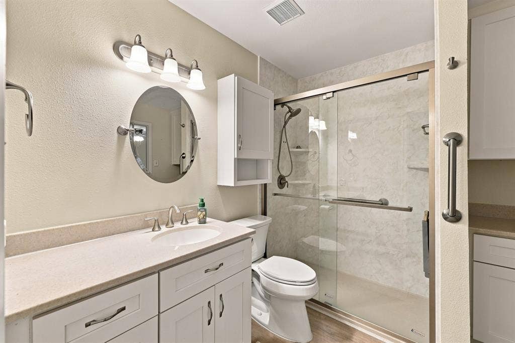 21121 County Road 1291, Flint, TX 75762 White shaker-style vanity with a light-toned countertop and integrated sink