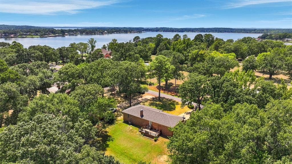 21121 County Road 1291, Flint, TX 75762 Expansive natural surroundings with a single-story brick residence