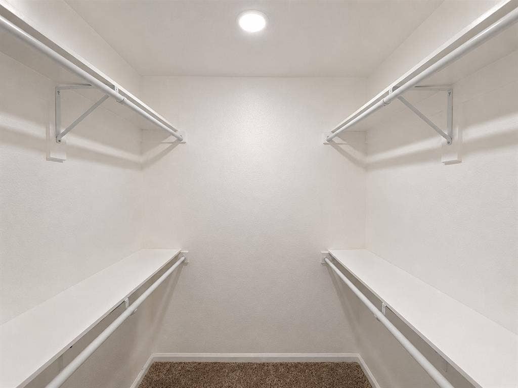 1842 Delmar Drive, Garland, TX 75040 Built-in storage shelves and hanging rods, recessed ceiling lighting, and textured wall finishes