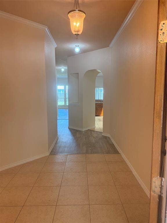 1111 Whitaker Way, Glenn Heights, TX 75154 Archway entry, crown molding, tile flooring, wood-finish flooring, recessed lighting