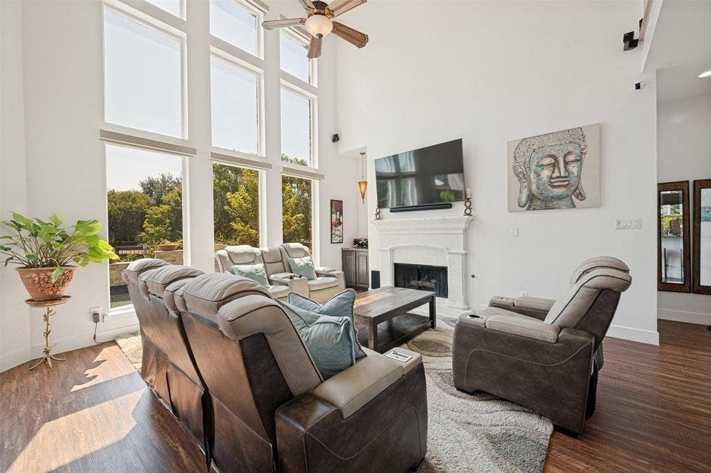 8524 Wellington Point Drive, Irving, TX 75063 Floor to ceiling wall of windows with remote controlled shades