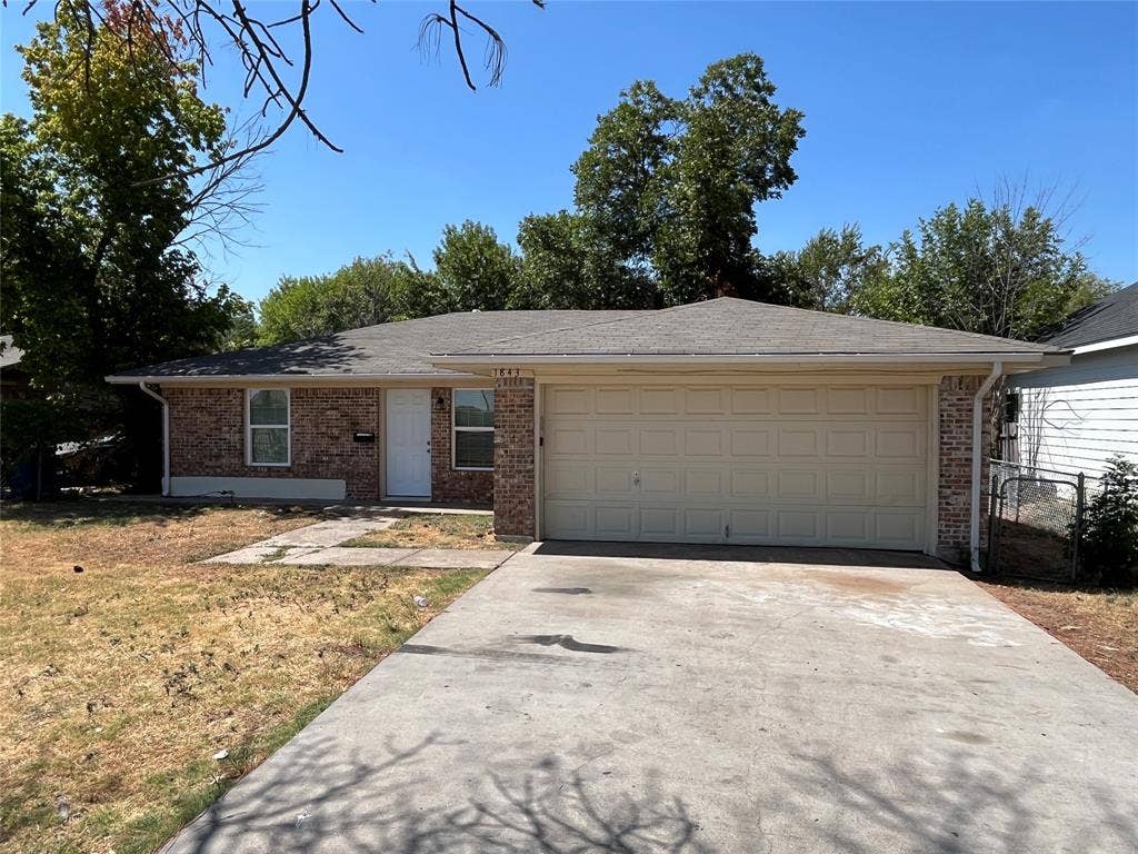1843 Greendale Drive, Dallas, TX 75217 Brick exterior with a single-story design