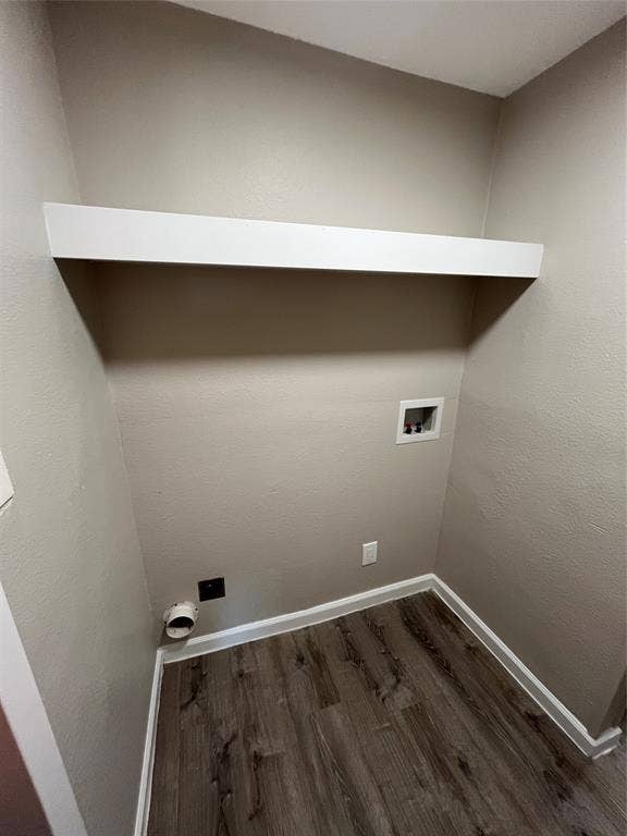 1843 Greendale Drive, Dallas, TX 75217 Wood-finish flooring, white wall shelving, wall-mounted electrical outlet, and plumbing hookups