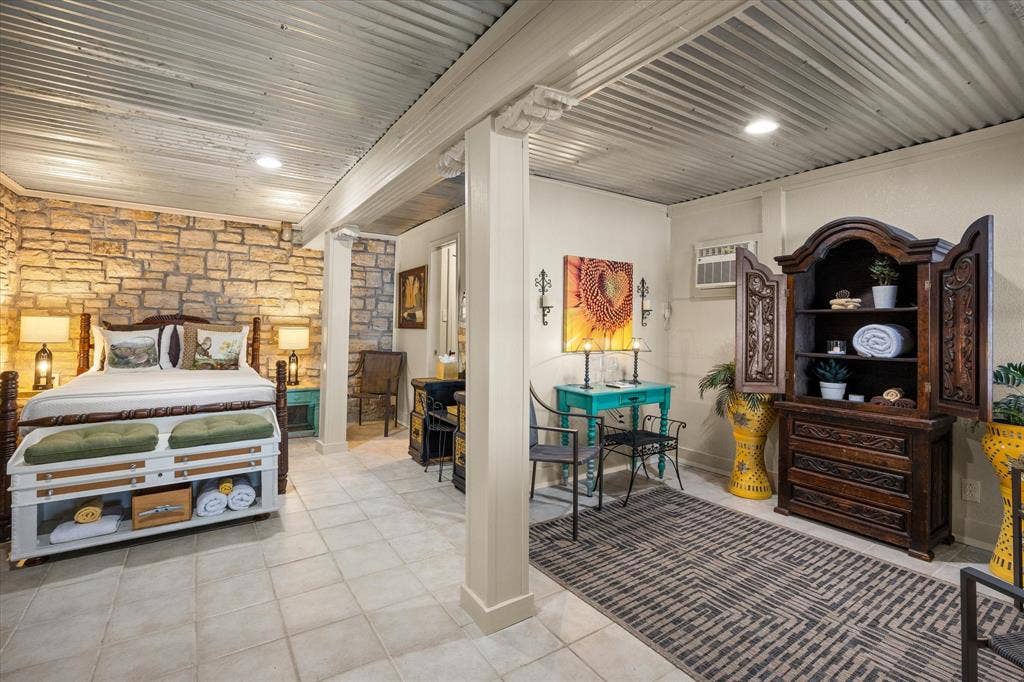 6606 Carol Court, Granbury, TX 76048 Bonus space on first level. Currently used as third bedroom with FULL BATH.