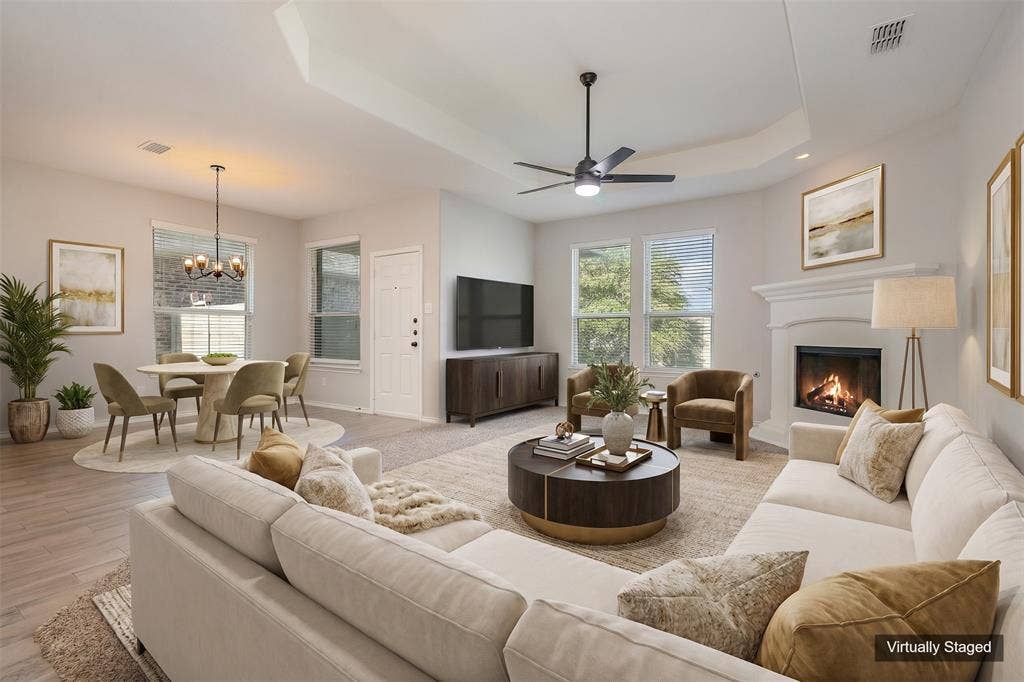 928 Dove Cove, Argyle, TX 76226 Virtually Staged View of living and dining area. Open floorplan