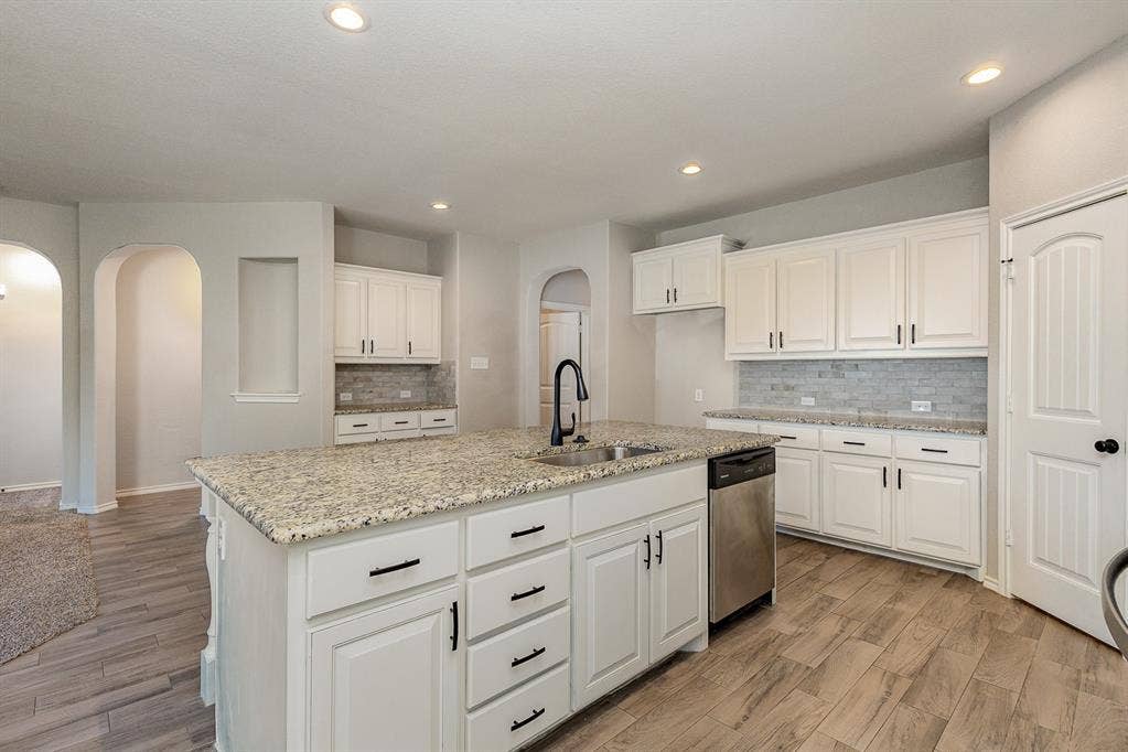 928 Dove Cove, Argyle, TX 76226 Open floorplan, large kitchen with plenty of counter space and cabinets.