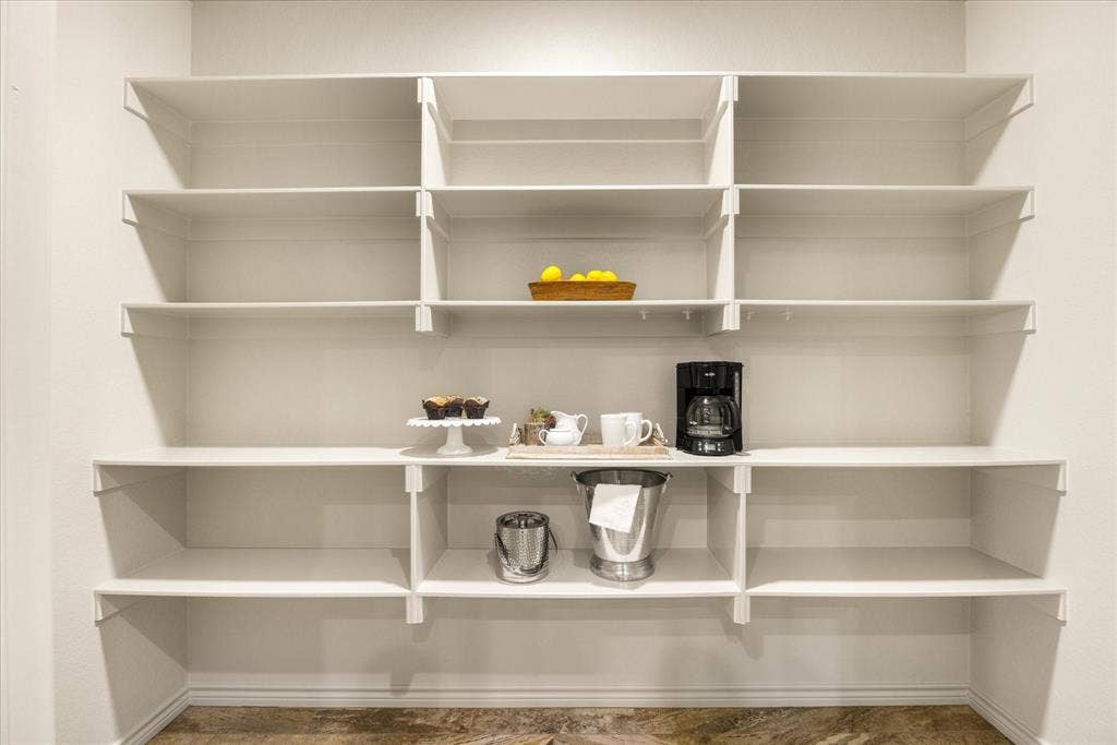 Amazing function and storage in this generous pantry.  Kitchen actually has 2 pantries.