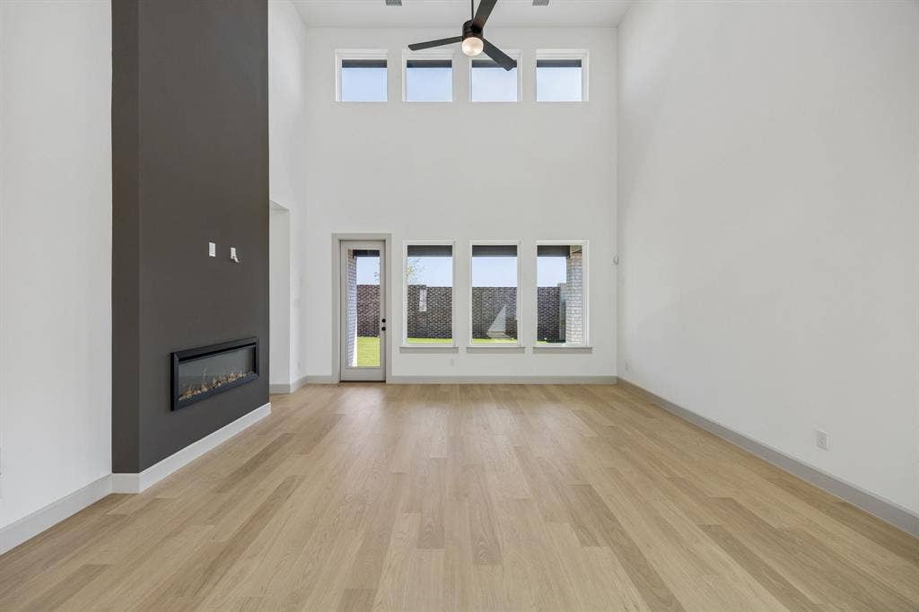 2312 Wispy Lane, Celina, TX 75009 Light, bright and airy, the entire family will love this wonderful family room!
