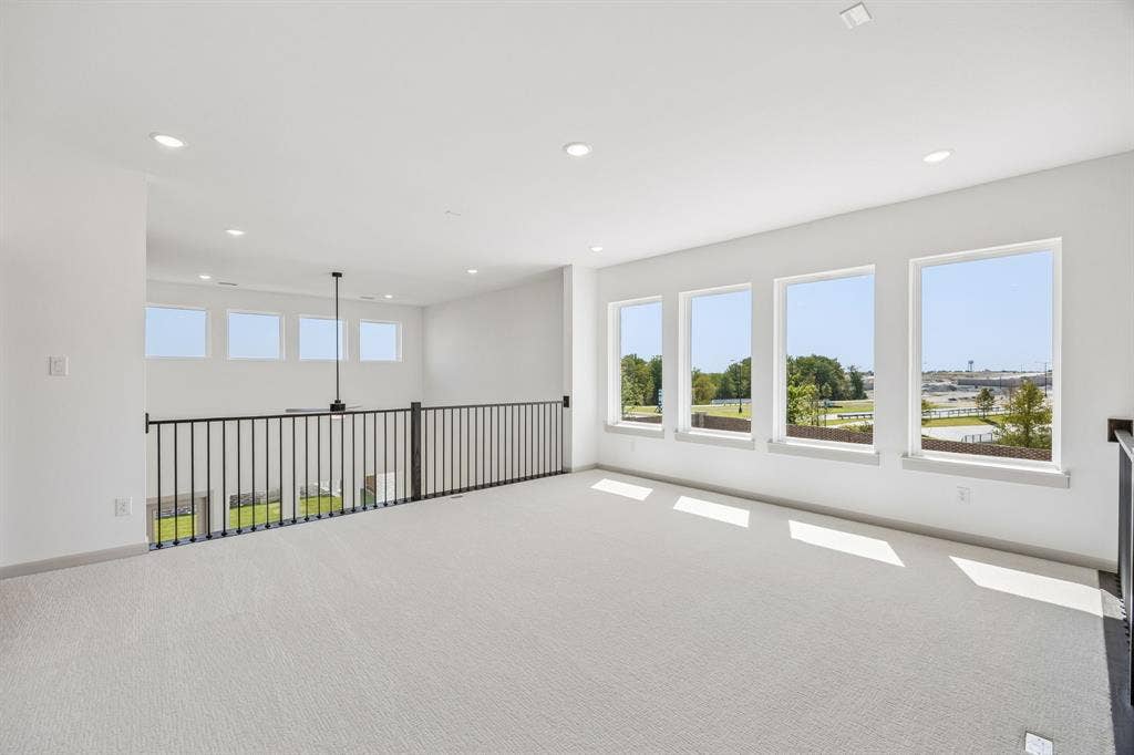 2312 Wispy Lane, Celina, TX 75009 Spacious and bright, this game room offers endless family fun time!