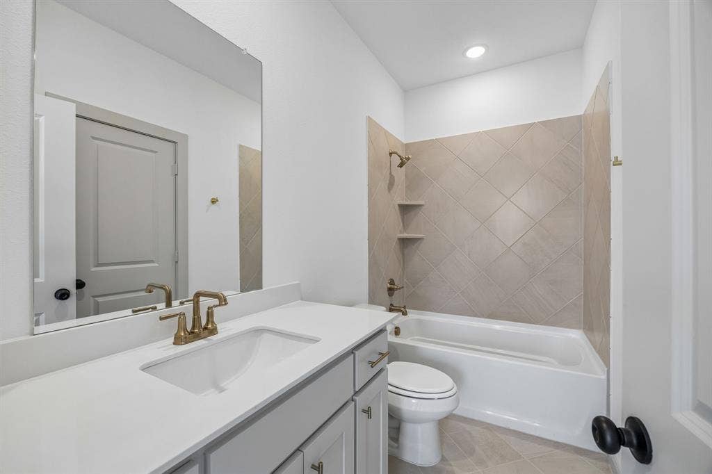 2312 Wispy Lane, Celina, TX 75009 Friends and family will feel right at home in any of the beautifully finished guest baths.