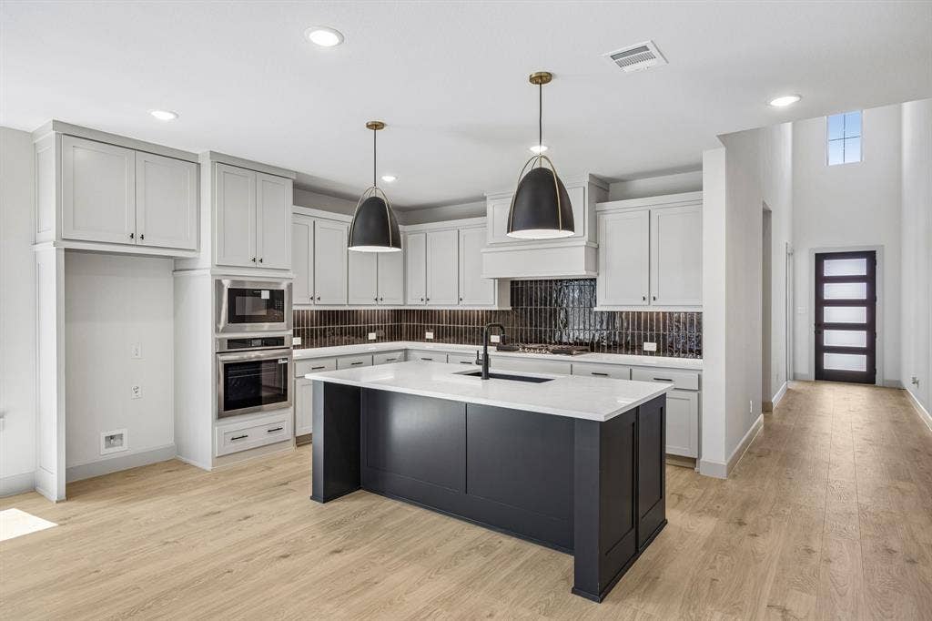 2308 Wispy Lane, Celina, TX 75009 Featuring outstanding storage and prep space, the chef in the family will fall in love with this dream kitchen!
