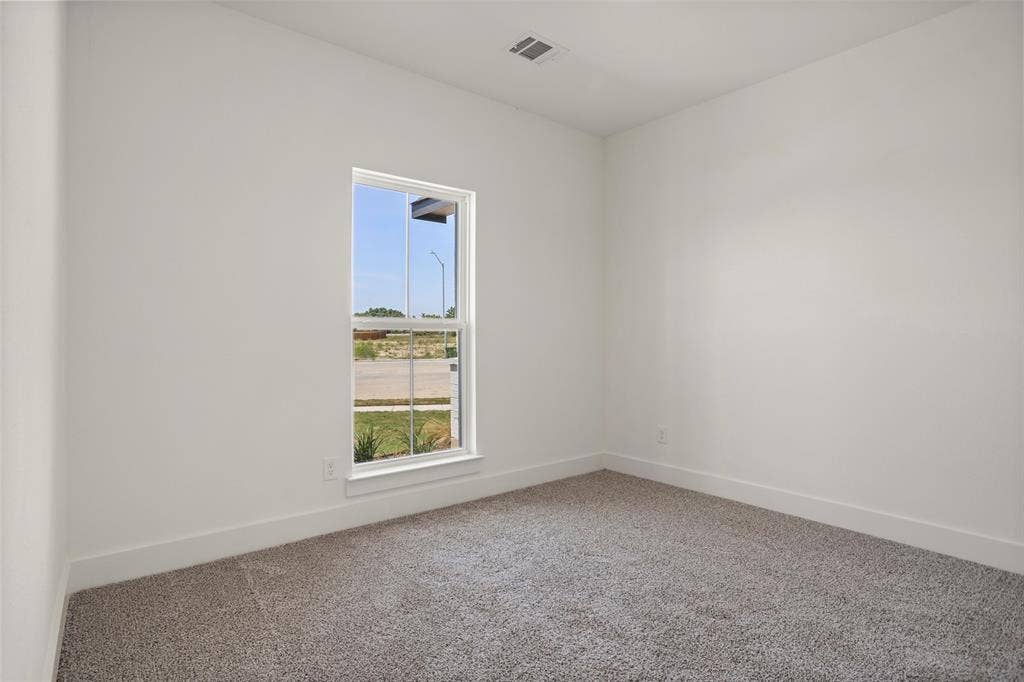 200 Cliff Court, Godley, TX 76044 Empty room with carpet floors