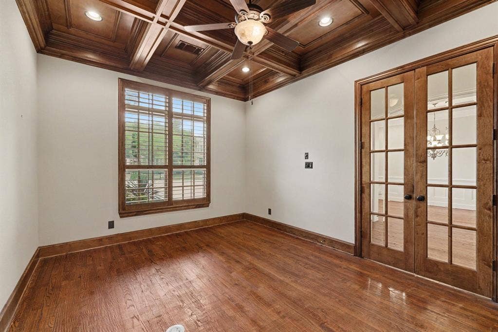 408 Blue Ridge Court, Allen, TX 75013 Hardwood flooring and a coffered wood-finish ceiling with recessed lighting