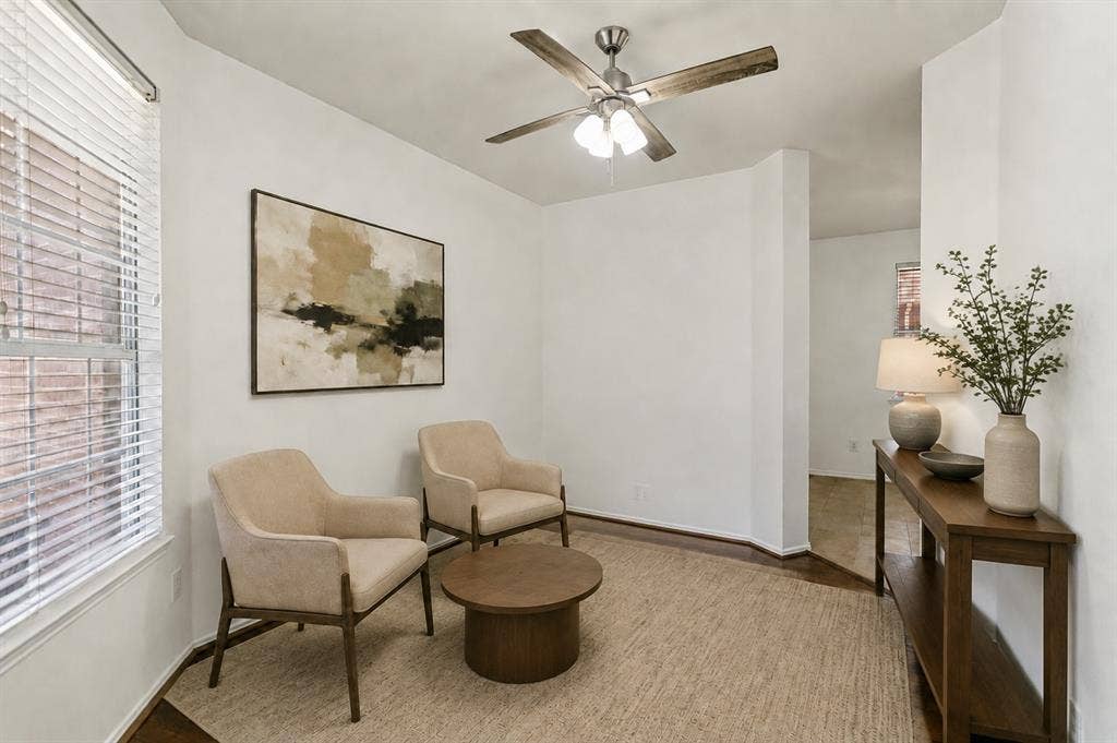 9604 Bull Creek Drive, Plano, TX 75025 Hardwood flooring, white walls, and a ceiling fan with light fixture