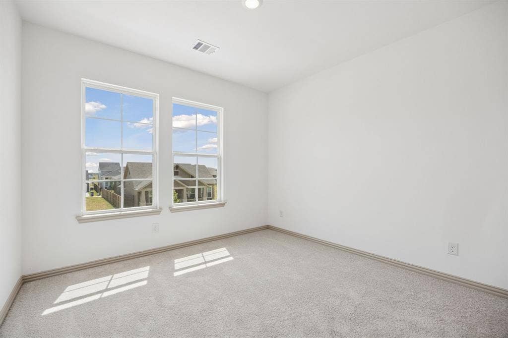 1013 Magdalena Way, Midlothian, TX 76065 You'll find a nicely sized secondary bedroom in our Boyd floor plan.