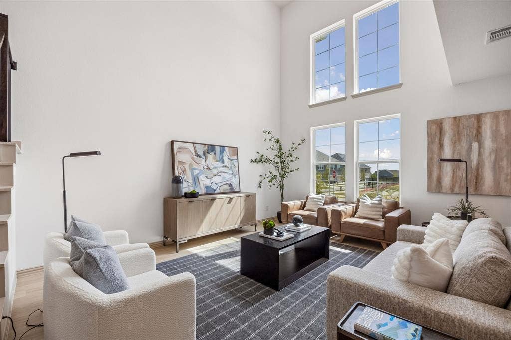 1013 Magdalena Way, Midlothian, TX 76065 Featuring volume windows in the family room, this beautiful home is filled with natural light.