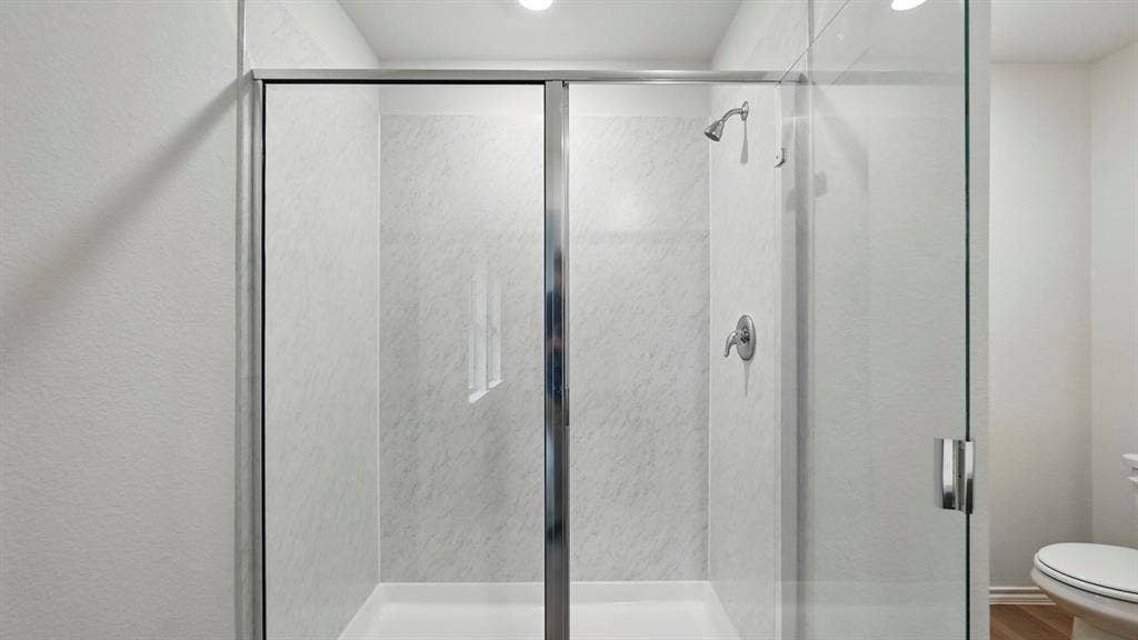 1912 Freeman Street, Tyler, TX 75702 Glass-enclosed shower with a showerhead and separate control valve